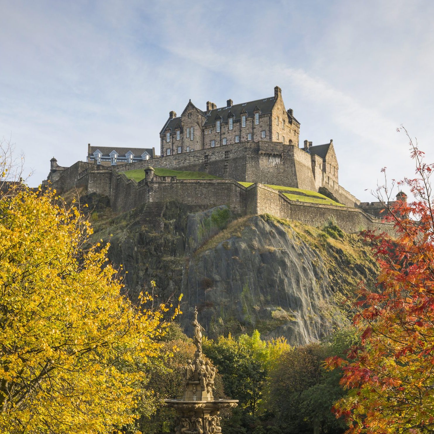 Edinburgh Castle In Autumn Seen From Princes Street Gardens